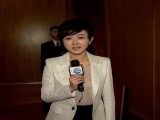 两会-20130306-人大开幕式上忙碌的中外媒体